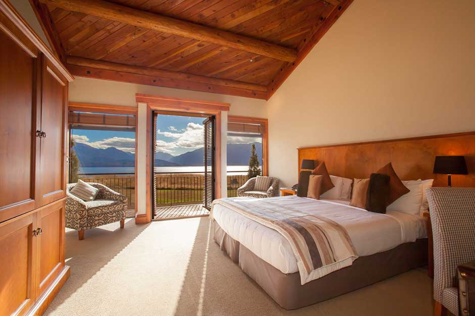 Fiordland Lodge room king bed 