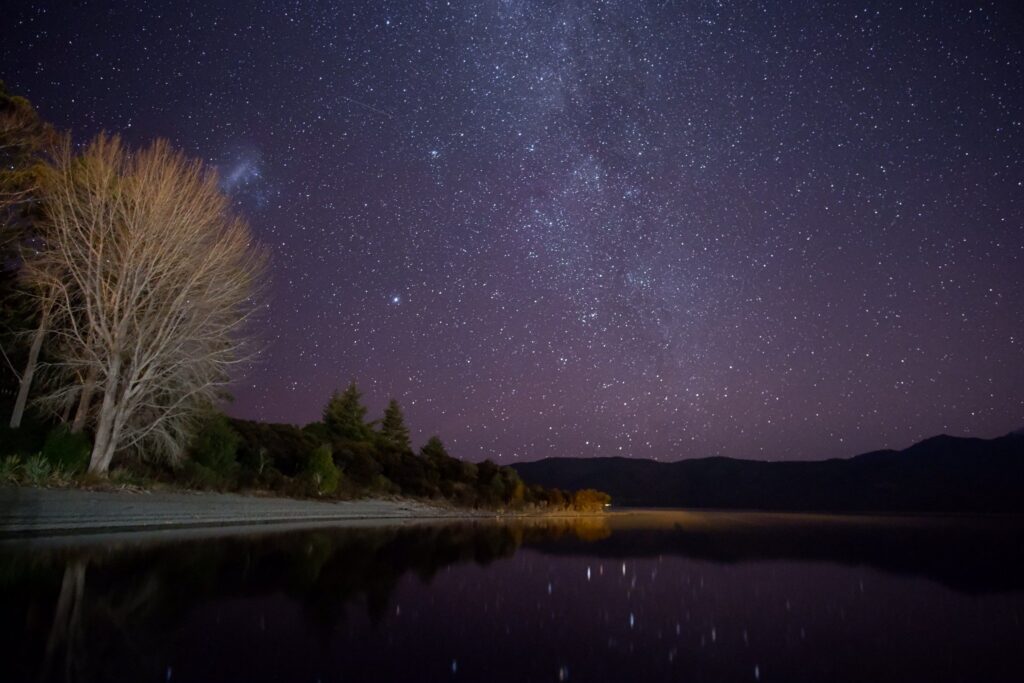 Southern Lights glowing above Lake Te Anau
